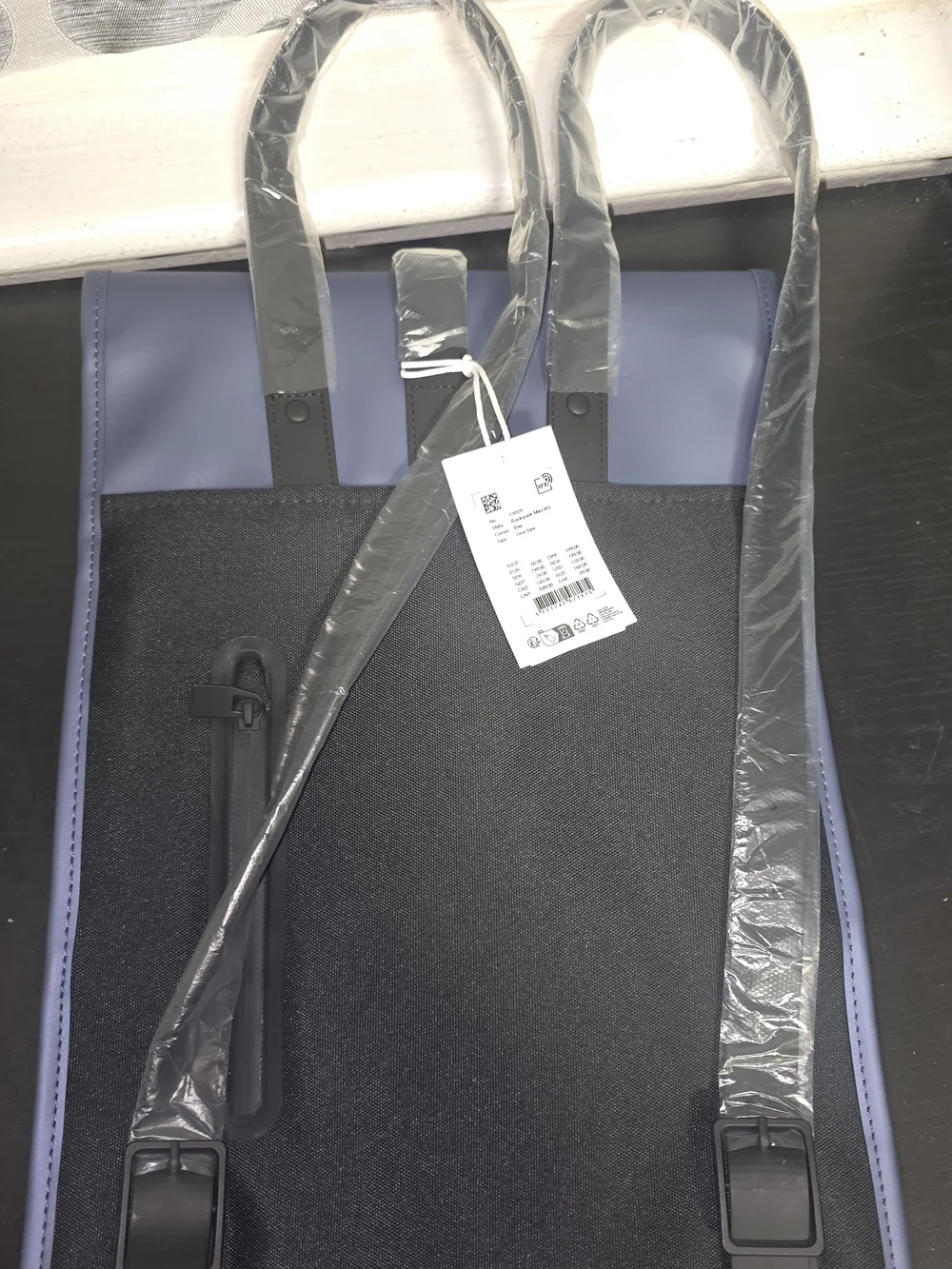 Rains Matte Blue Minimalist Backpack